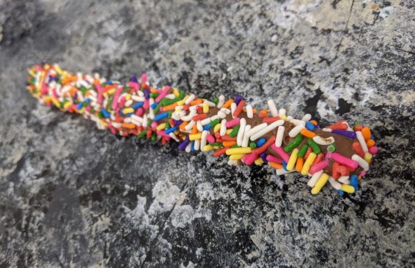 Milk Chocolate Pretzel Rod with Rainbow Sprinkles